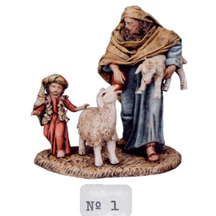 Pastor con nio y corderos