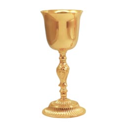 Cliz en metal dorado con fuste ornamentado y...