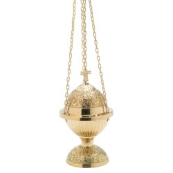 Incensario dorado con grabado ornamental y cr...