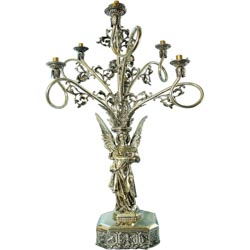 Candelabro de 7 luces en metal dorado con fig...