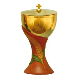 Copn en metal dorado con base de madera pint...