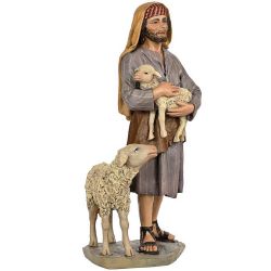 Grupo pastor con corderos mayo